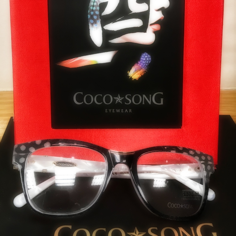 Coco Song hand make their frames using layers of coloured acetate as well as real feathers and semi precious stones. Come see them in our Rugeley and Lichfield practices  